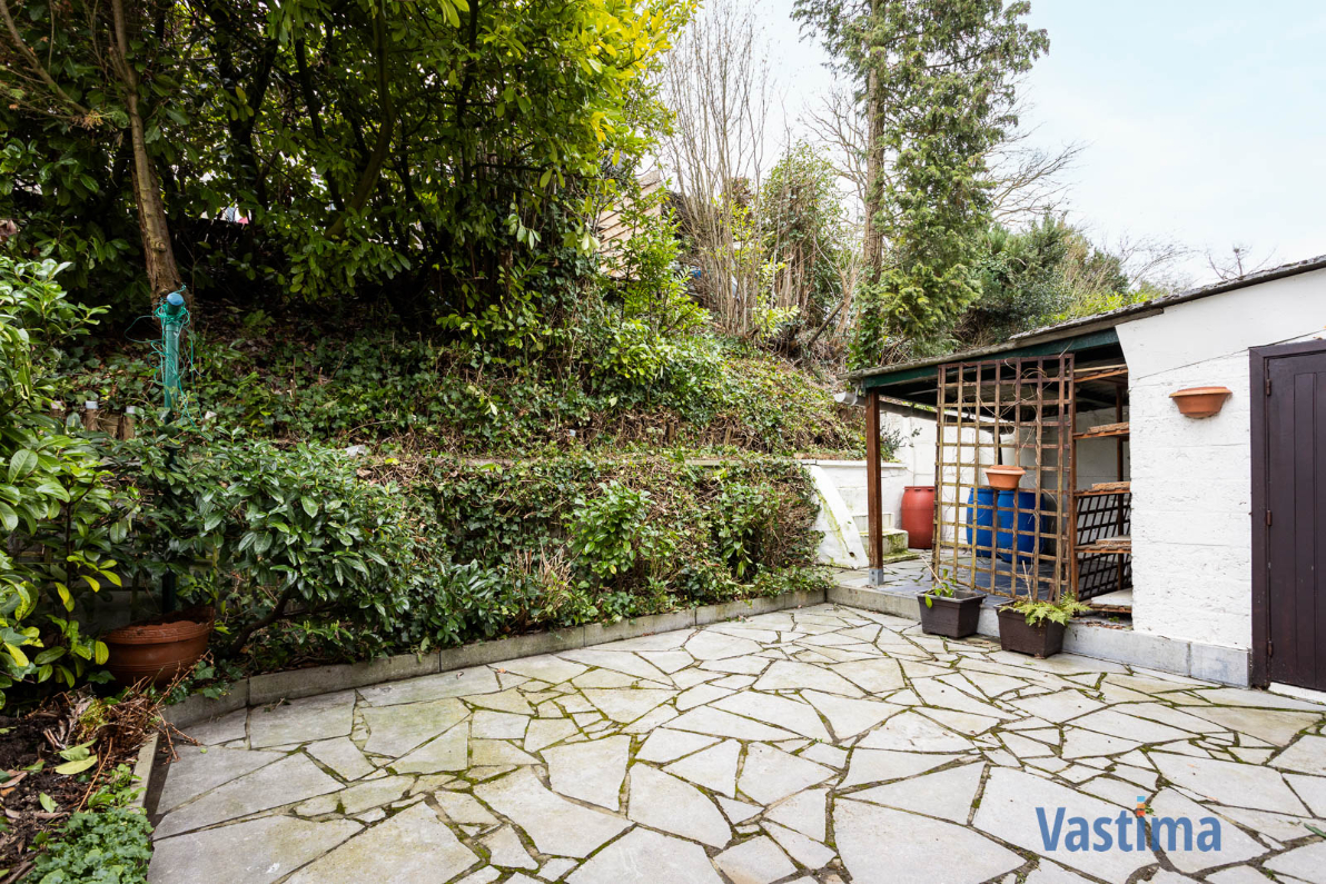 Immo Vastima - Huis Te koop Lede - Halfopen woning in Lede met 3 slaapkamers, garage en buitenruimte