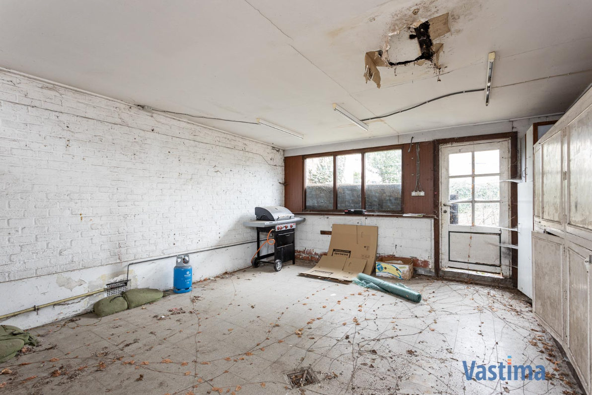 Immo Vastima - Huis Te koop Merchtem - Renovatieproject in centrum Merchtem