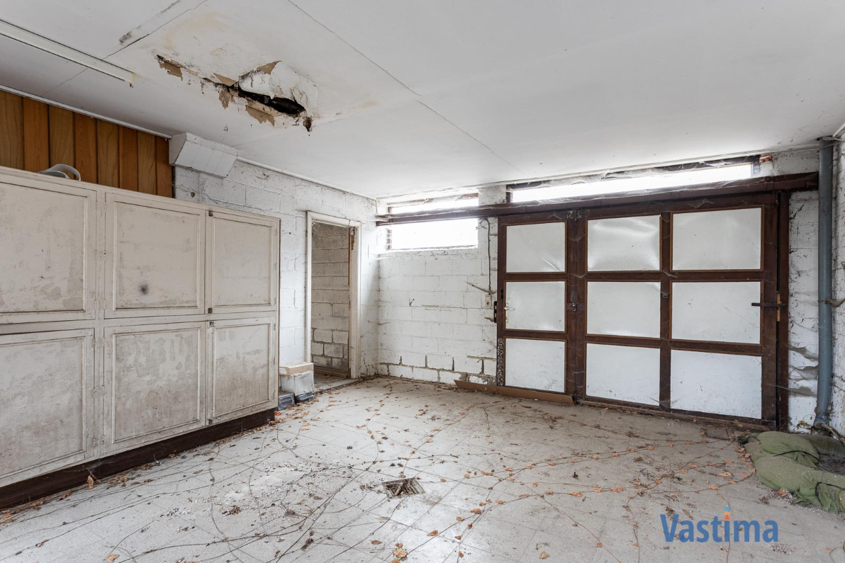 Immo Vastima - Huis Te koop Merchtem - Renovatieproject in centrum Merchtem