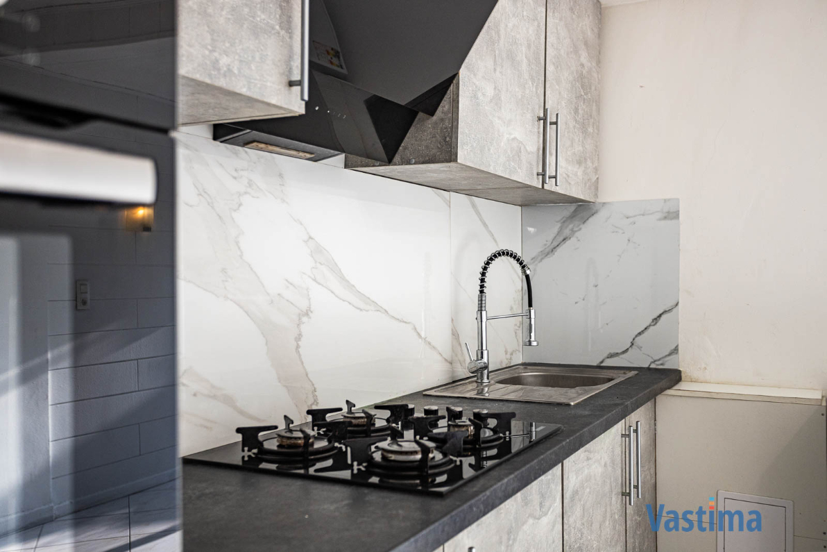 Immo Vastima - Huis Te koop Aalst - Lichtvolle starterswoning met zuid gerichte tuin