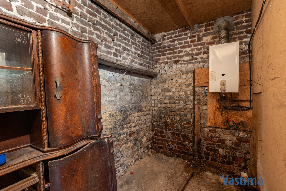 Immo Vastima - Huis Te koop Gijzegem - Halfopen woning met uitbreidingsmogelijkheden in hartje Gijzegem