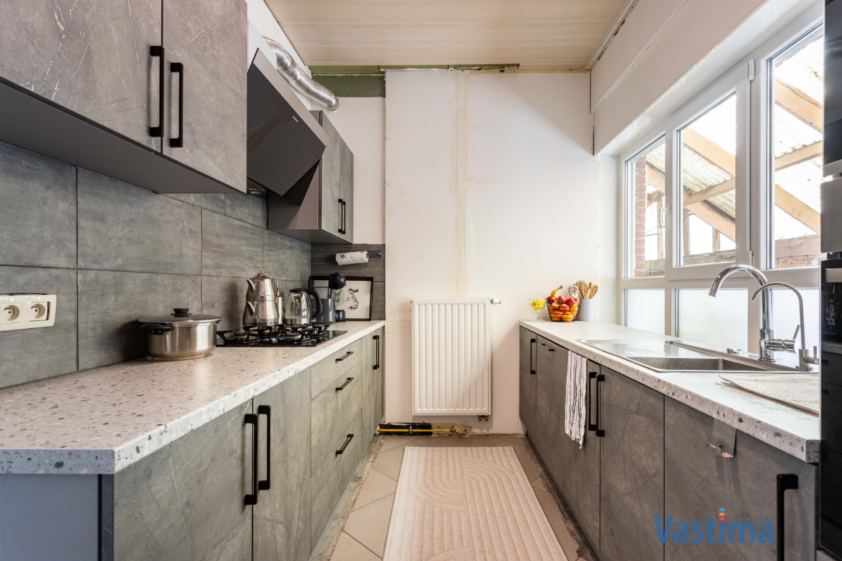 Immo Vastima - Huis Te koop Aalst - Rustige gelegen halfopen bebouwing met tuin