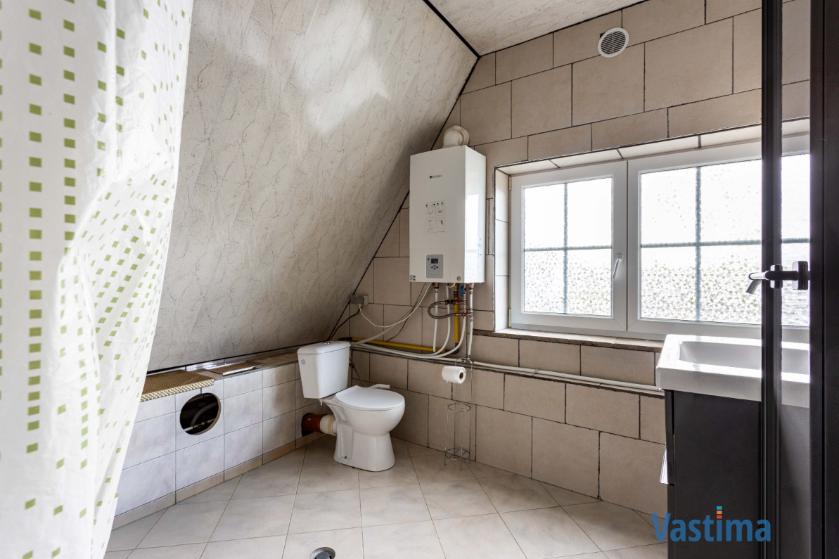 Immo Vastima - Huis Te koop Aalst - Rustige gelegen halfopen bebouwing met tuin