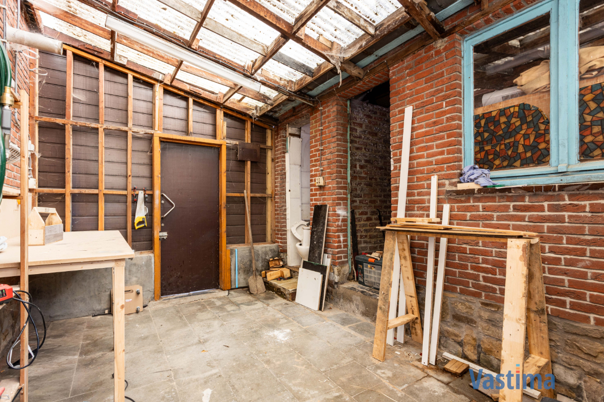 Immo Vastima - Huis Te koop Aalst - Rustige gelegen halfopen bebouwing met tuin