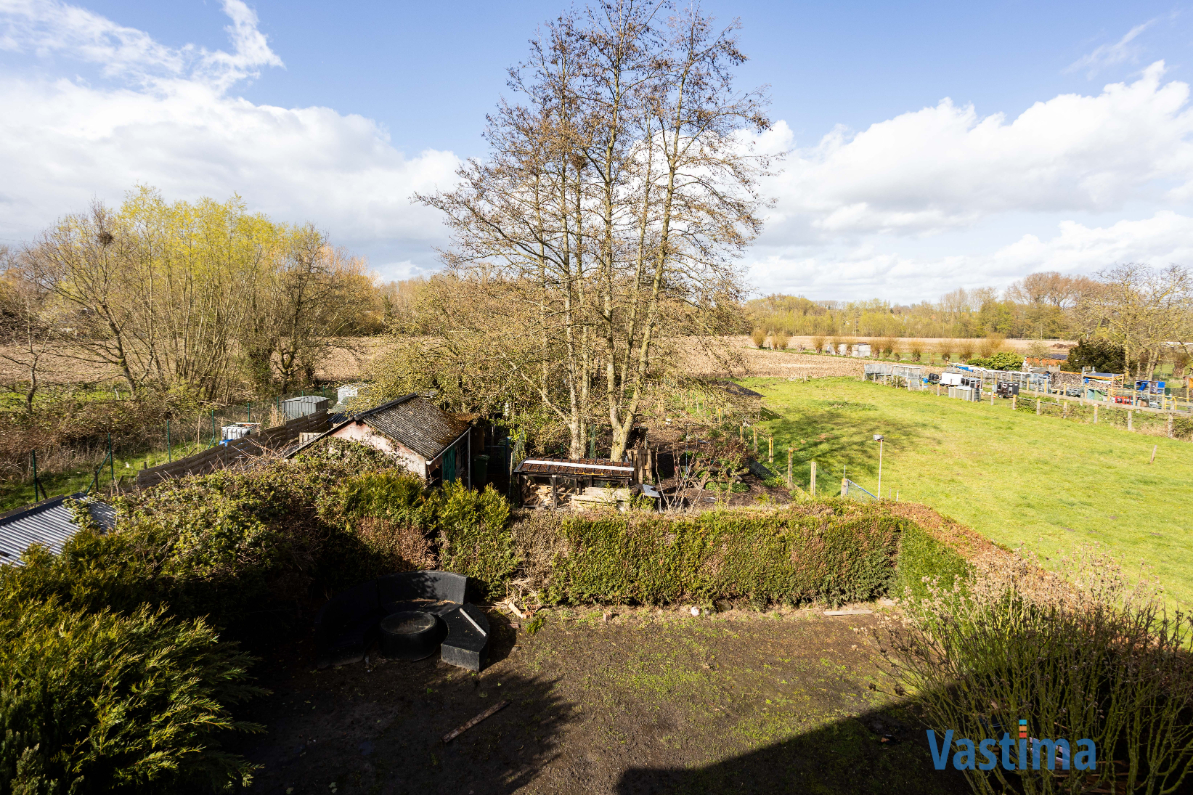 Immo Vastima - Huis Te koop Aalst - Rustige gelegen halfopen bebouwing met tuin