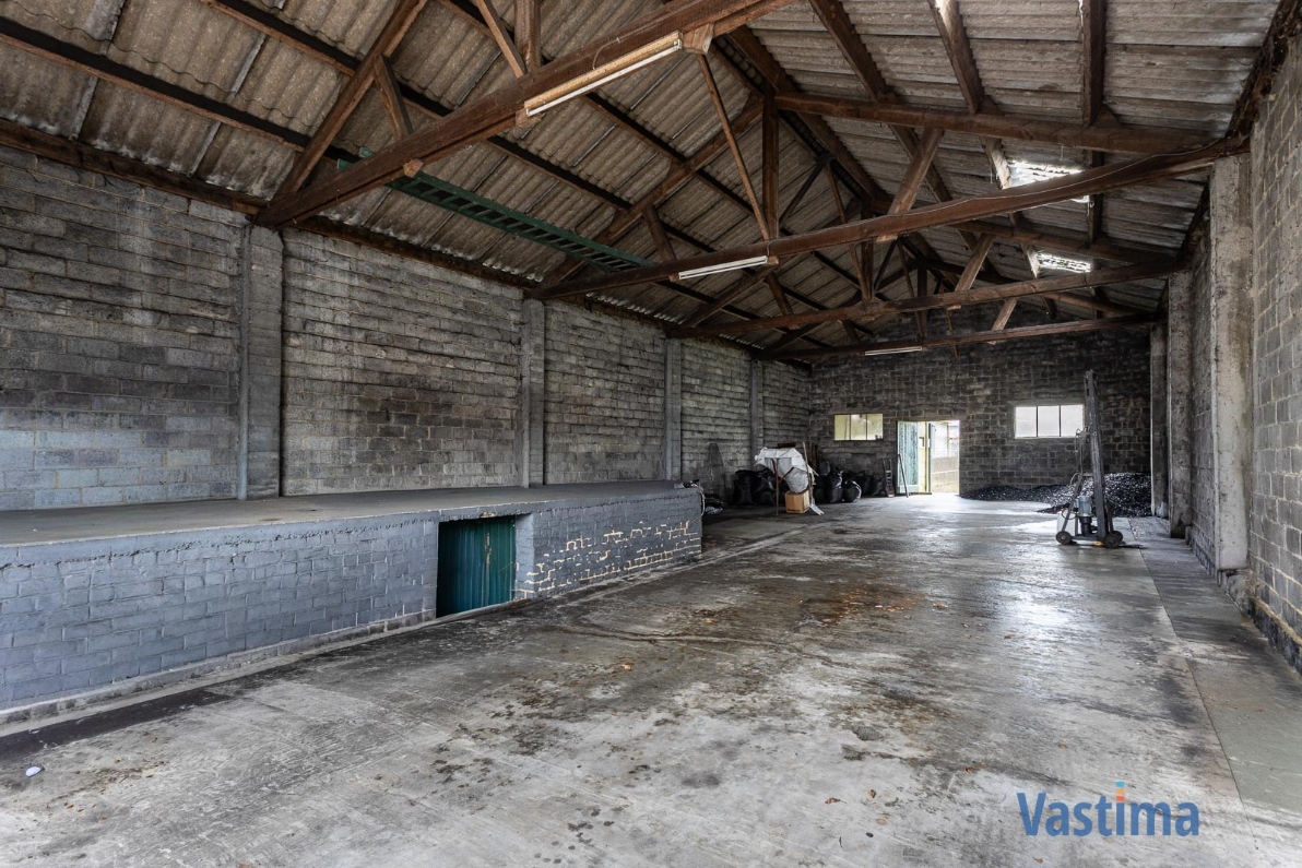 Immo Vastima - Commercieel Te koop Erondegem - Woning met loods en grote tuin