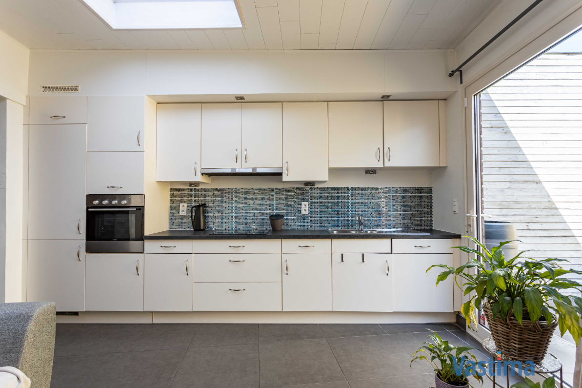 Immo Vastima - Huis Te koop Erembodegem - Energiezuinige en instapklare starterswoning met 2 slaapkamers in hartje Erembodegem