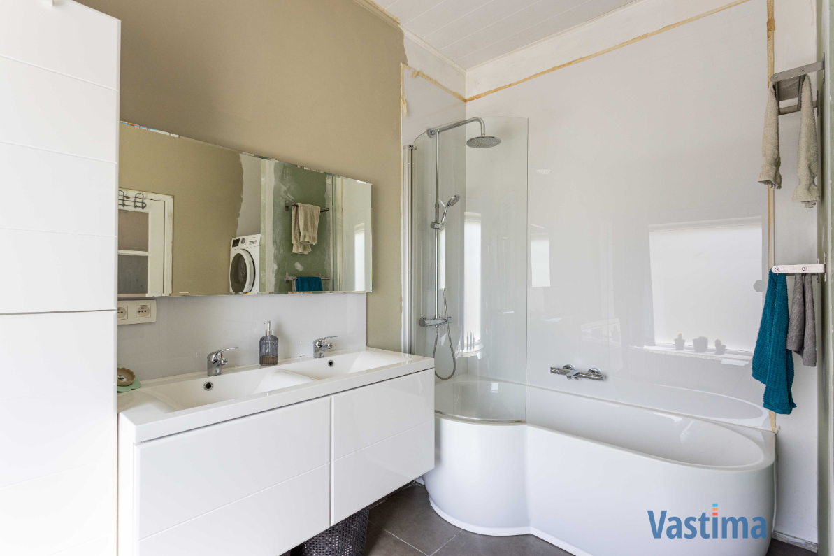 Immo Vastima - Huis Te koop Erembodegem - Energiezuinige en instapklare starterswoning met 2 slaapkamers in hartje Erembodegem