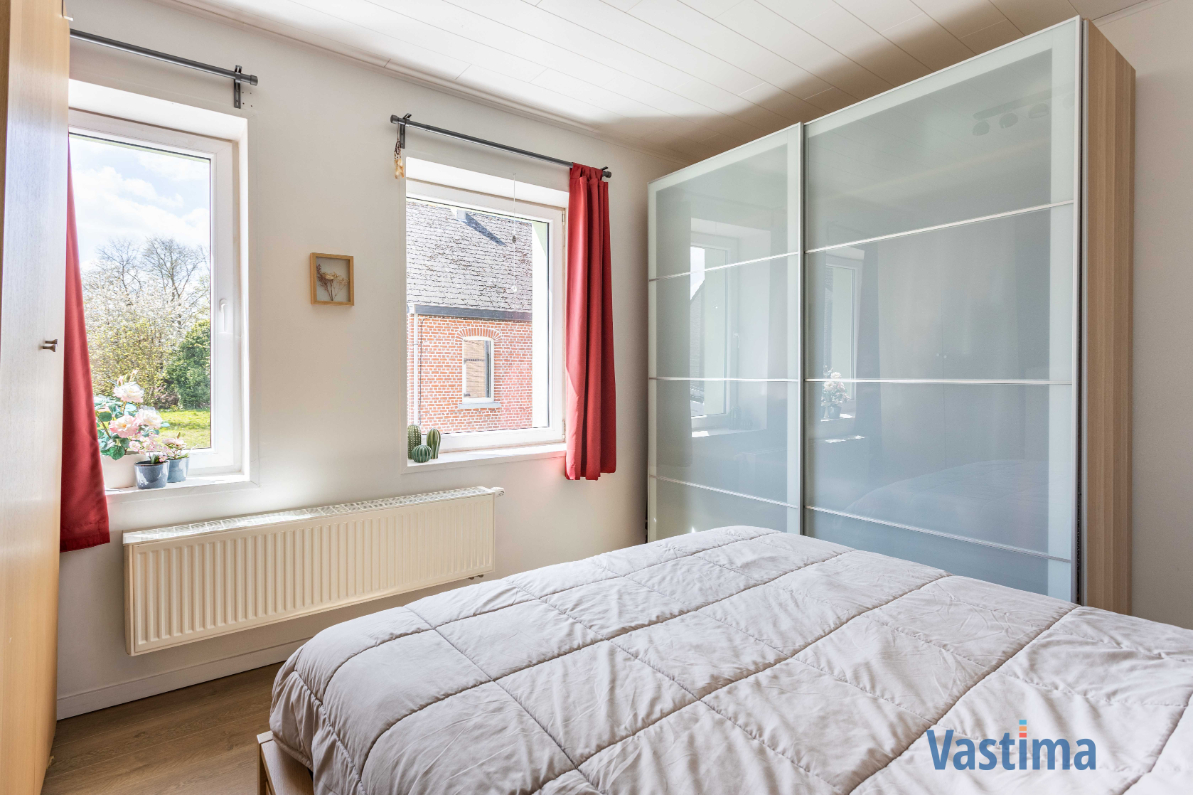 Immo Vastima - Huis Te koop Erembodegem - Energiezuinige en instapklare starterswoning met 2 slaapkamers in hartje Erembodegem