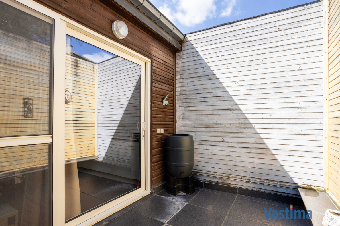 Immo Vastima - Huis Te koop Erembodegem - Energiezuinige en instapklare starterswoning met 2 slaapkamers in hartje Erembodegem