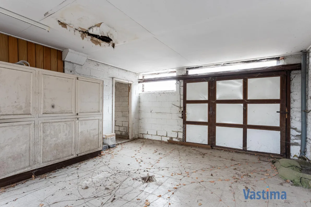 Immo Vastima - Huis Te koop Merchtem - Renovatieproject in centrum Merchtem