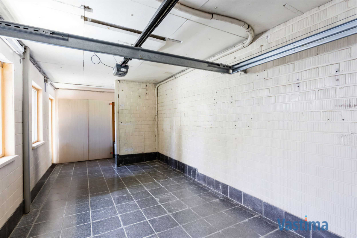 Immo Vastima - Huis Te koop Erembodegem - Lichtrijke halfopen bebouwing met 3 slaapkamers, tuin en garage