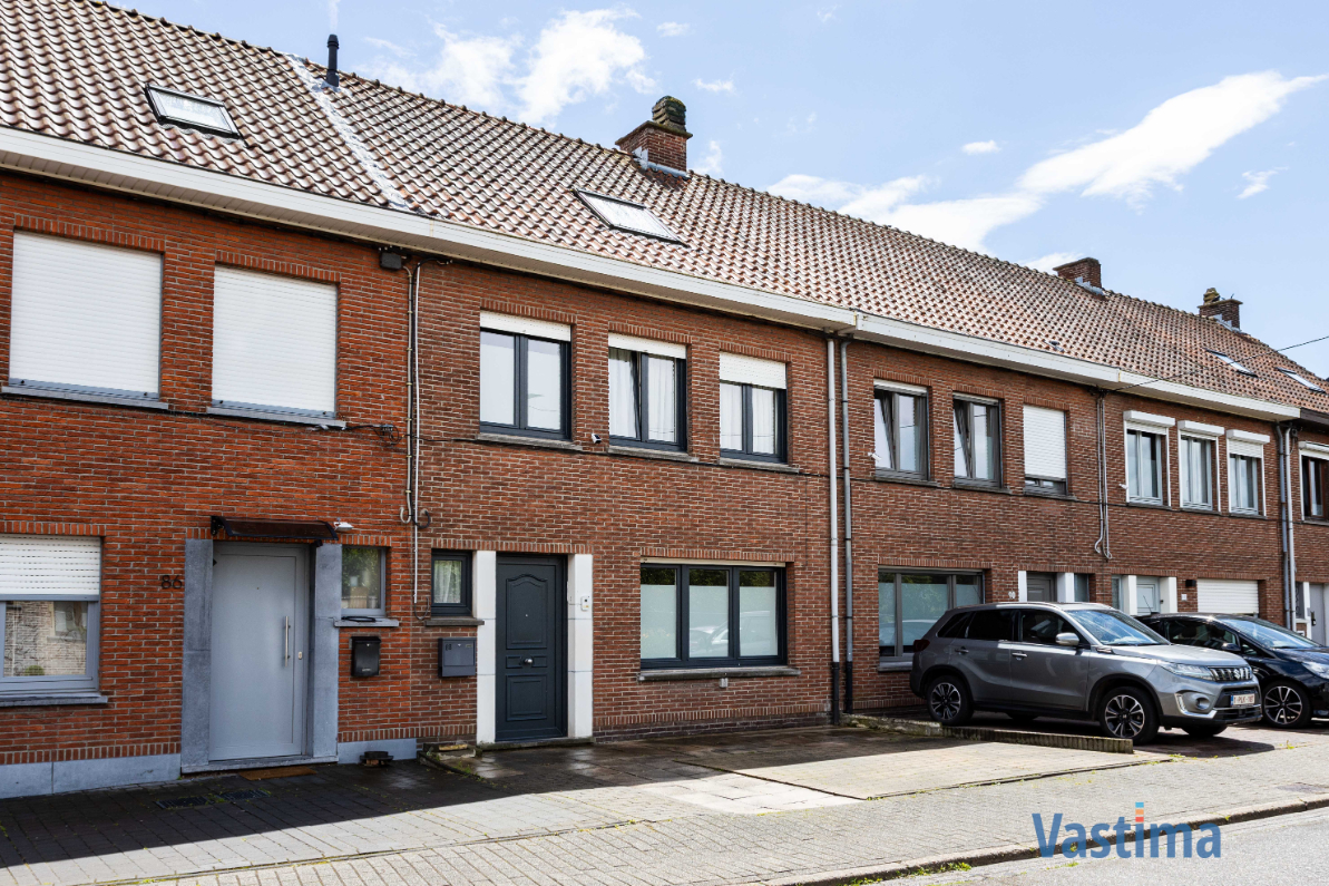 Immo Vastima - Huis Te koop Denderleeuw - Instapklare gezinswoning met 2 staanplaatsen, zonnige tuin en parkzicht
