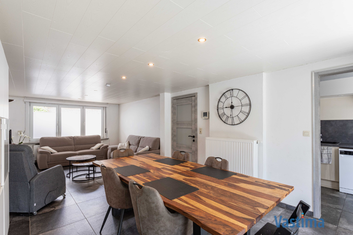 Immo Vastima - Huis Te koop Denderleeuw - Instapklare gezinswoning met 2 staanplaatsen, zonnige tuin en parkzicht