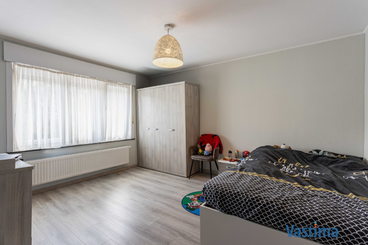Immo Vastima - Huis Te koop Denderleeuw - Instapklare gezinswoning met 2 staanplaatsen, zonnige tuin en parkzicht