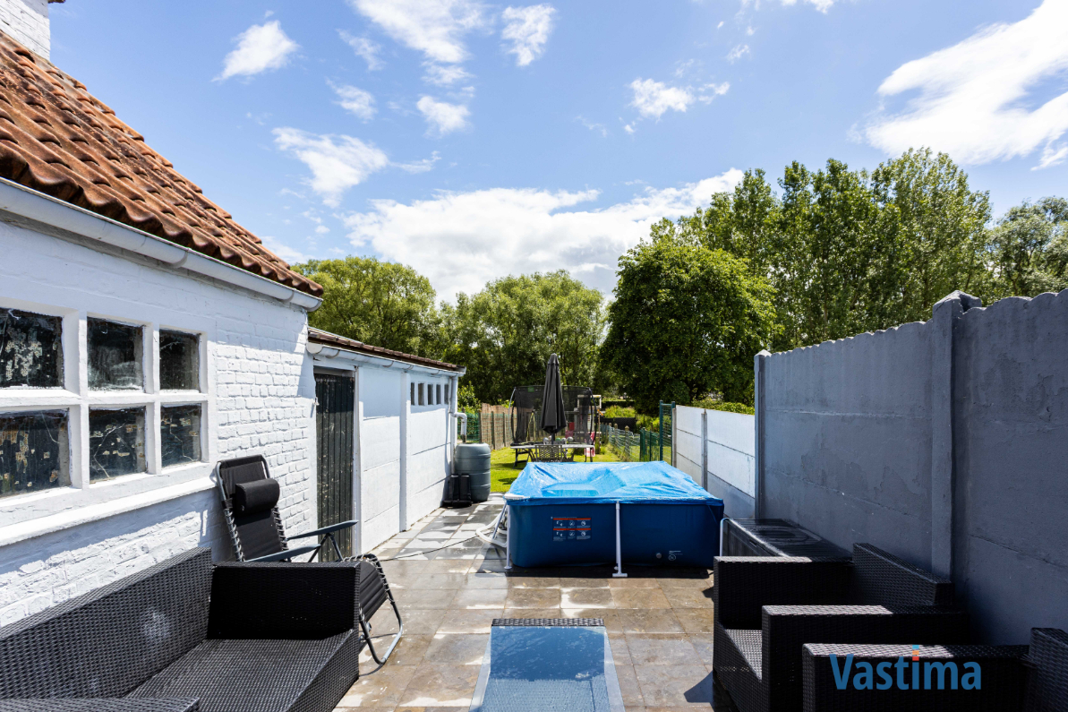 Immo Vastima - Huis Te koop Denderleeuw - Instapklare gezinswoning met 2 staanplaatsen, zonnige tuin en parkzicht