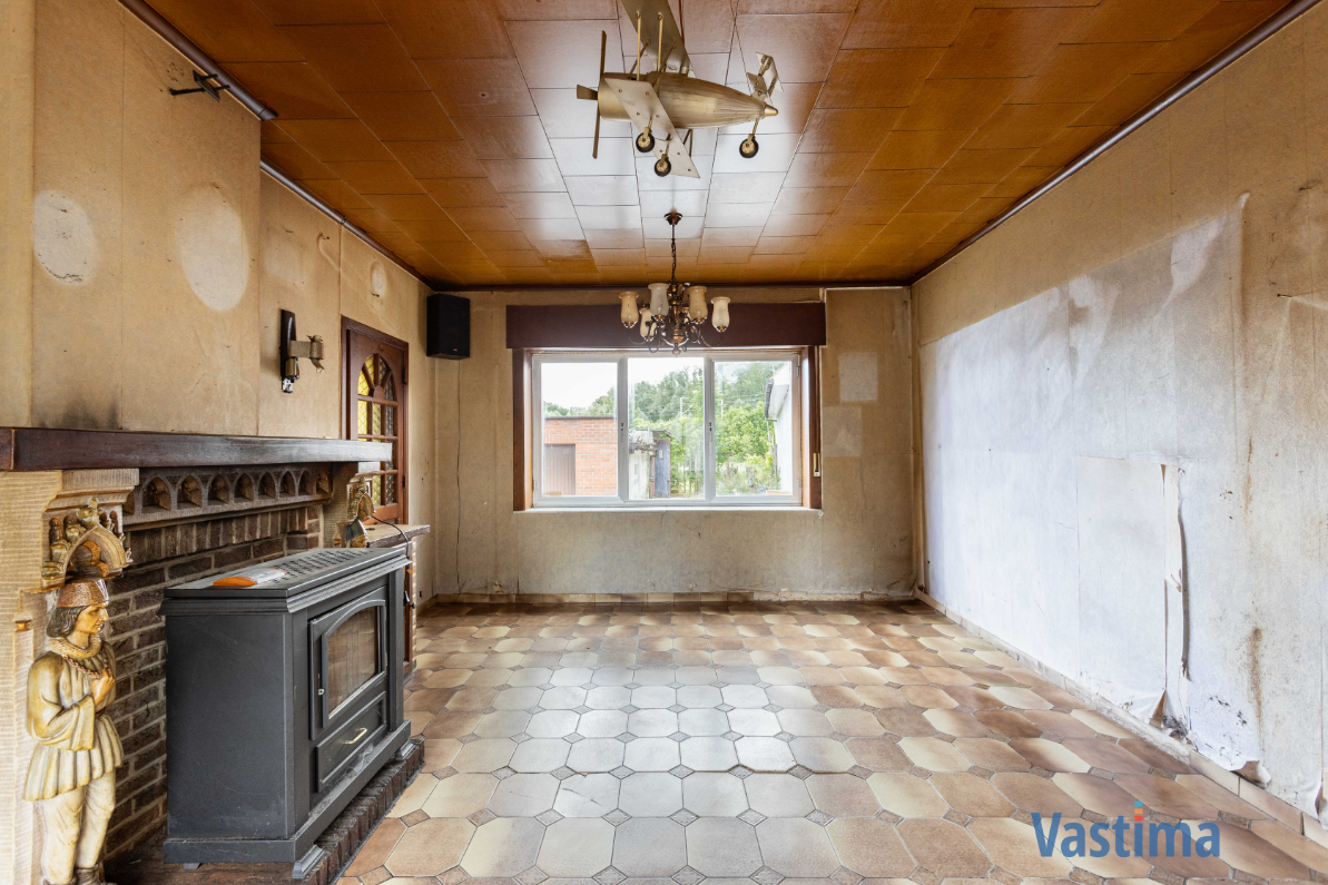 Immo Vastima - Huis Te koop Nieuwerkerken - Te renoveren woning met 3 slaapkamers, garage en tuin