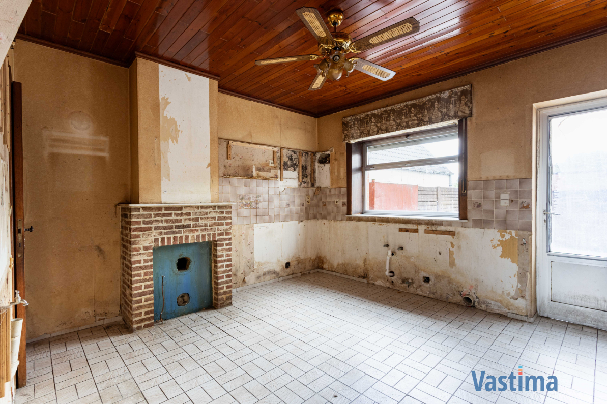Immo Vastima - Huis Te koop Nieuwerkerken - Te renoveren woning met 3 slaapkamers, garage en tuin