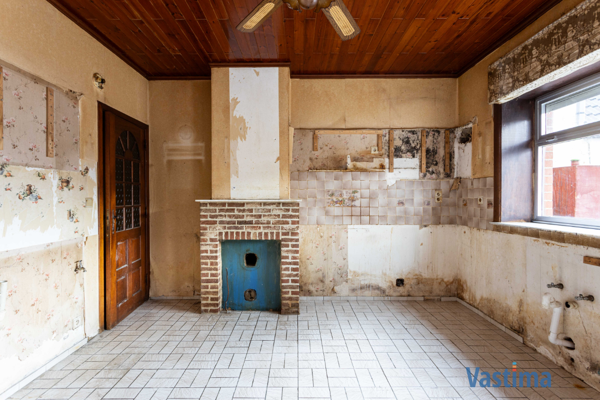 Immo Vastima - Huis Te koop Nieuwerkerken - Te renoveren woning met 3 slaapkamers, garage en tuin