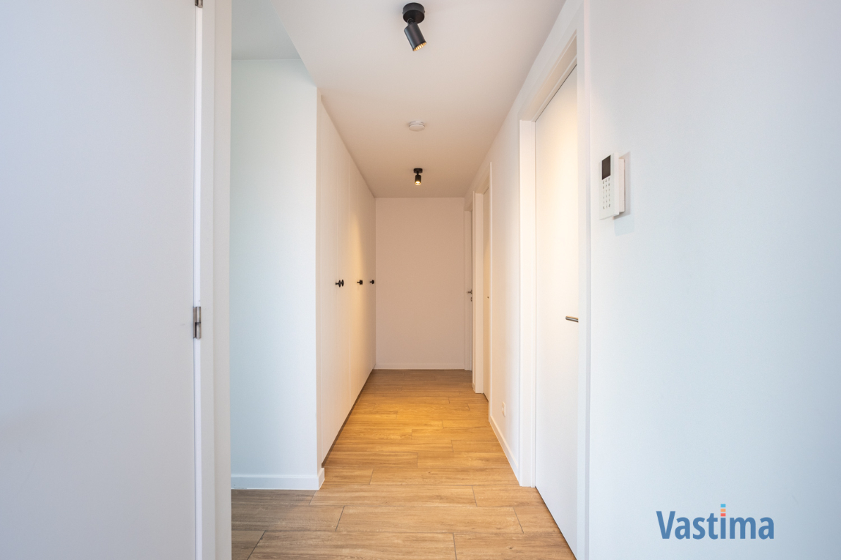 Immo Vastima - Appartement Te koop Bambrugge - Energiezuinig appartement met 2 slaapkamers, terras en zicht op groen