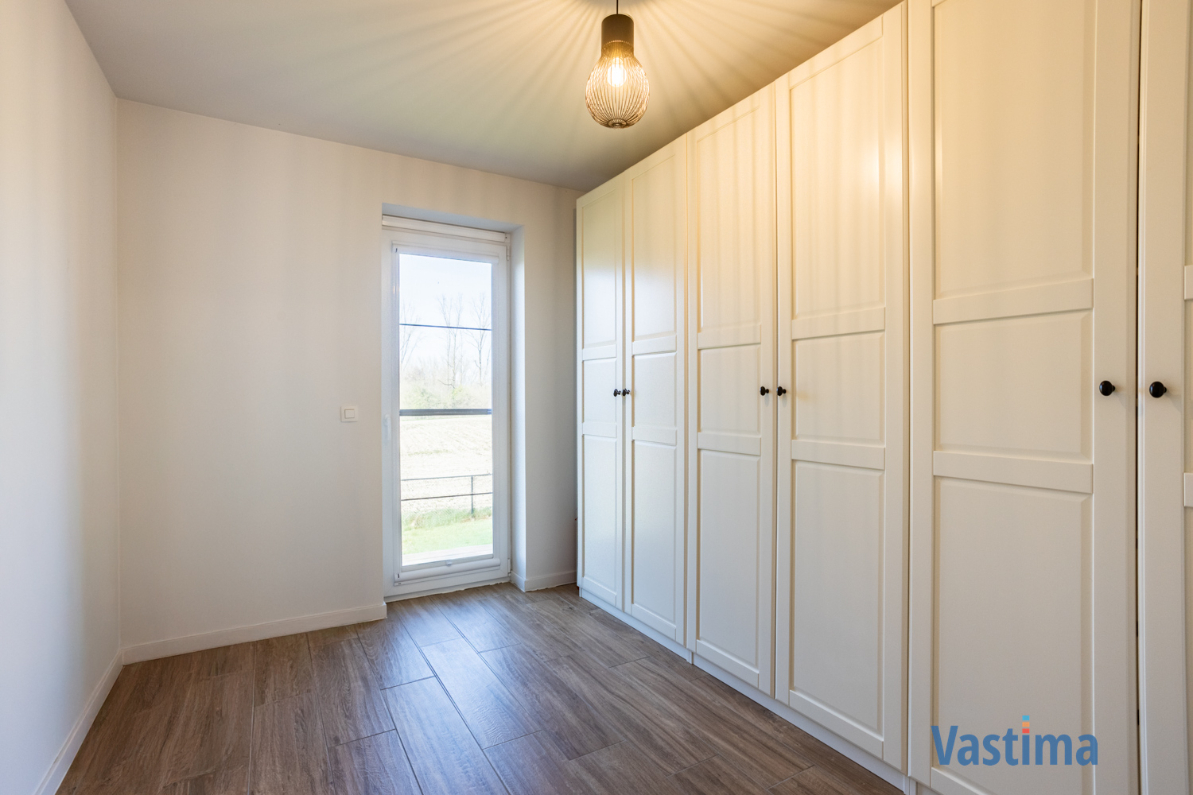 Immo Vastima - Appartement Te koop Bambrugge - Energiezuinig appartement met 2 slaapkamers, terras en zicht op groen