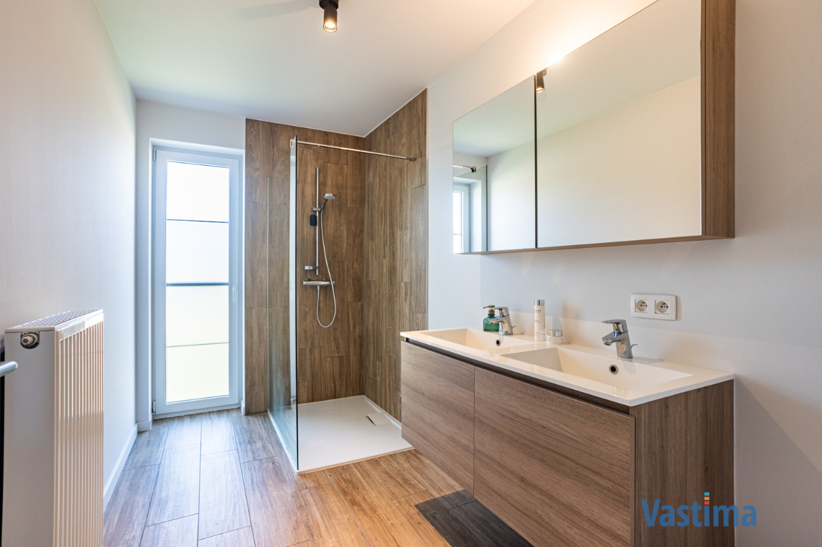 Immo Vastima - Appartement Te koop Bambrugge - Energiezuinig appartement met 2 slaapkamers, terras en zicht op groen