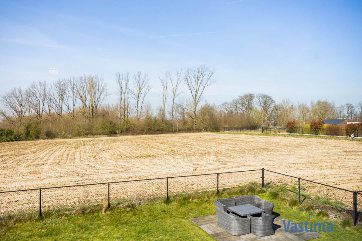 Immo Vastima - Appartement Te koop Bambrugge - Energiezuinig appartement met 2 slaapkamers, terras en zicht op groen
