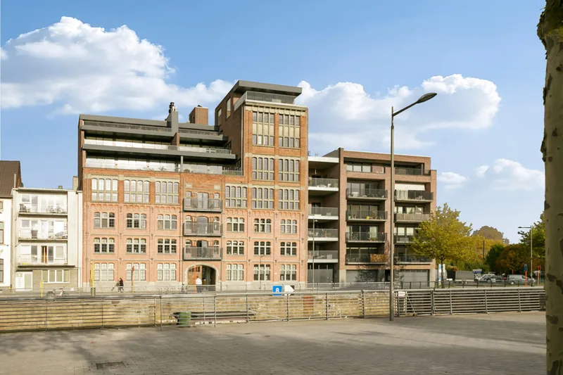 Immo Vastima - Appartement Verkocht Aalst - Stijlvol appartement in iconisch gebouw met ruim terras in hartje Aalst