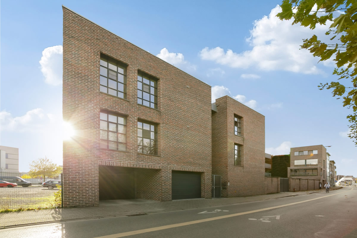 Immo Vastima - Appartement Te koop Aalst - Stijlvol appartement in iconisch gebouw met ruim terras in hartje Aalst