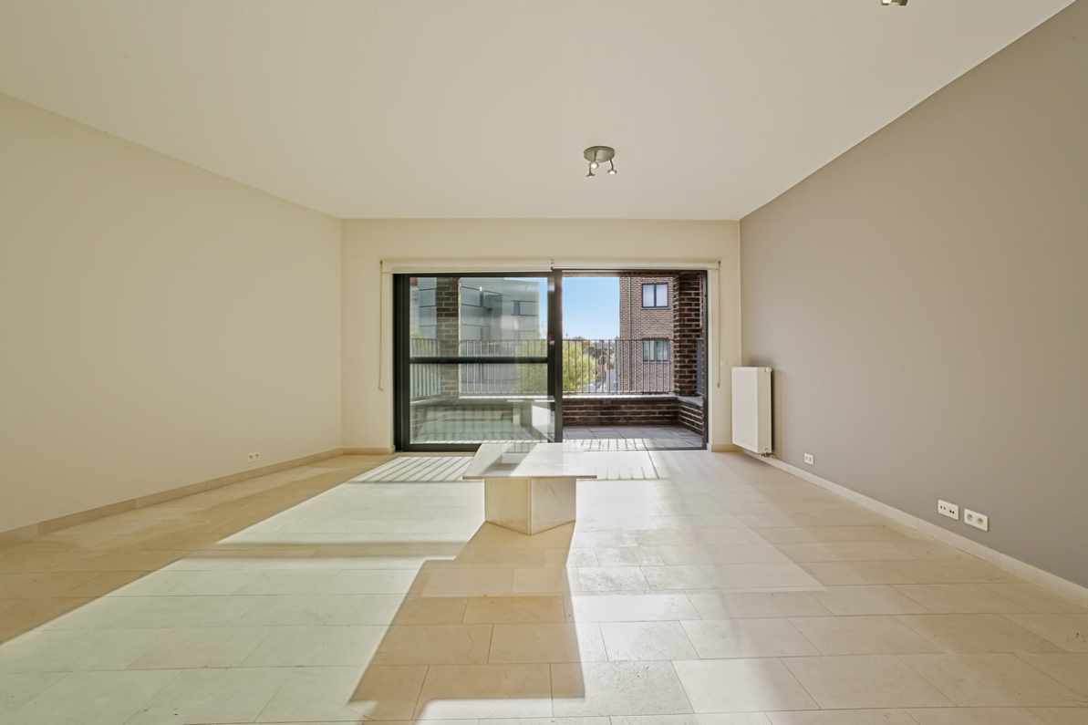 Immo Vastima - Appartement Te koop Aalst - Stijlvol appartement in iconisch gebouw met ruim terras in hartje Aalst