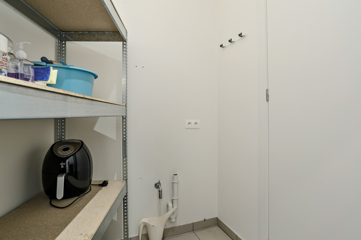 Immo Vastima - Appartement Te koop Aalst - Stijlvol appartement in iconisch gebouw met ruim terras in hartje Aalst
