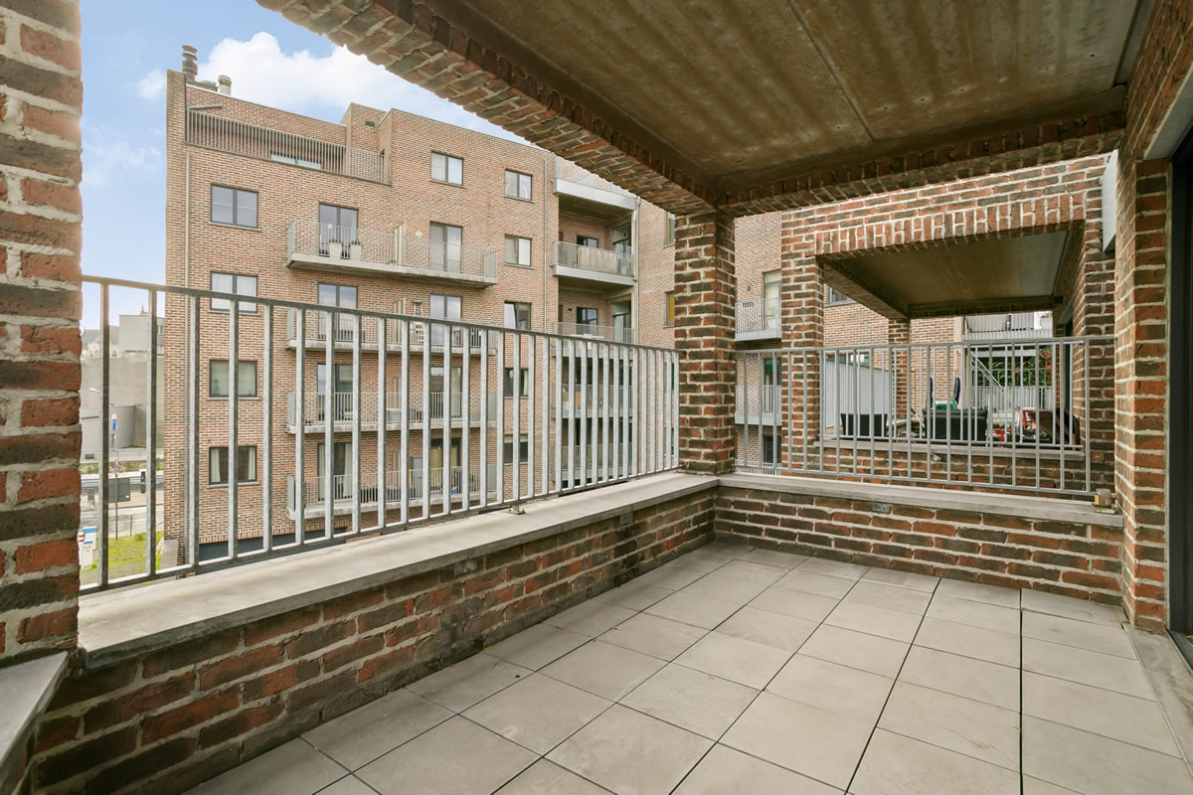 Immo Vastima - Appartement Te koop Aalst - Stijlvol appartement in iconisch gebouw met ruim terras in hartje Aalst