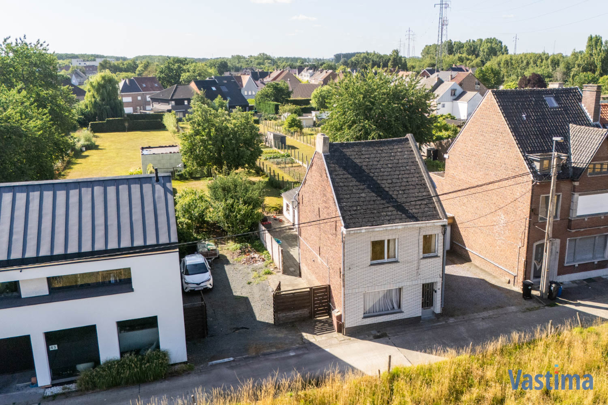 Immo Vastima - Grond Te koop Erembodegem - Perceel grond nabij centrum Erembodegem met zuidgerichte tuin