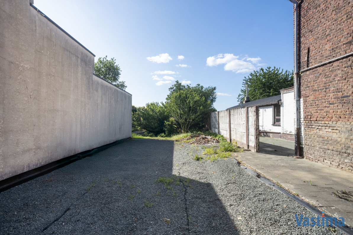 Immo Vastima - Grond Te koop Erembodegem - Perceel grond nabij centrum Erembodegem met zuidgerichte tuin