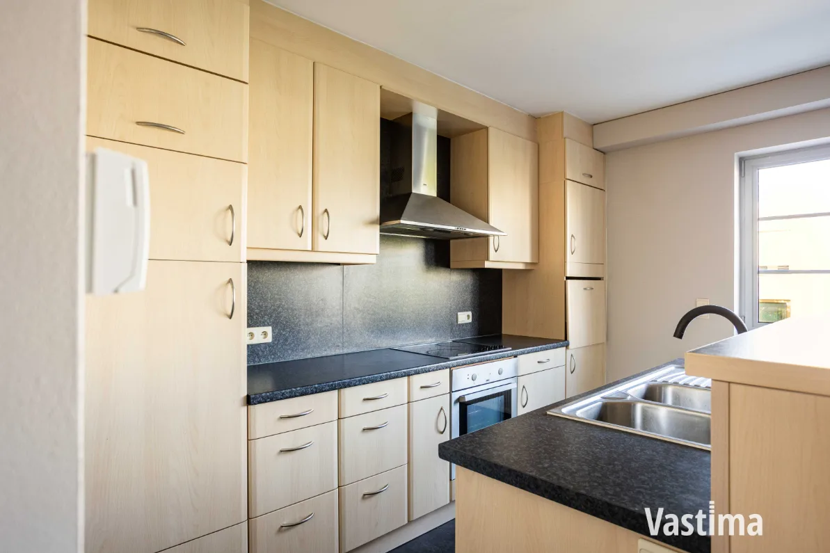 Immo Vastima - Appartement Te koop Opwijk - Instapklaar duplexappartement in het centrum van Opwijk