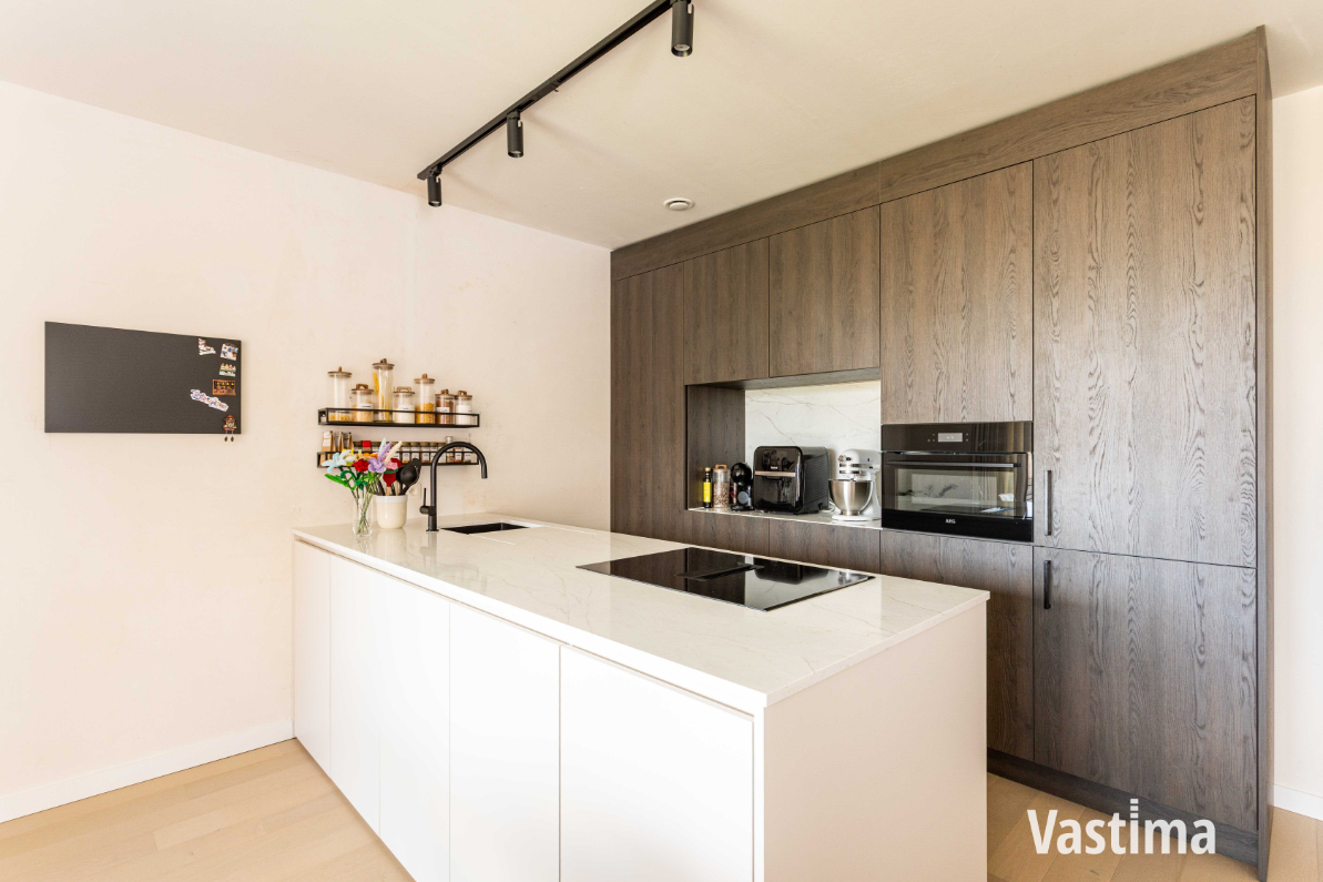 Immo Vastima - Appartement Te koop Merelbeke - Exclusief wonen in hartje Merelbeke – Recent appartement met ondergrondse staanplaats