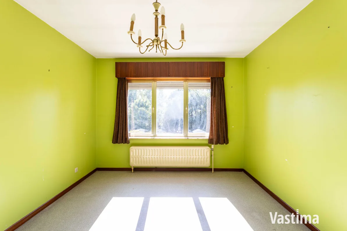 Immo Vastima - Huis Te koop Lebbeke - Woning met 3 slaapkamers, garage en ruime tuin
