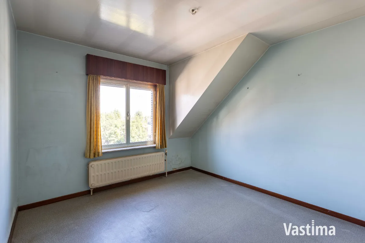 Immo Vastima - Huis Te koop Lebbeke - Woning met 3 slaapkamers, garage en ruime tuin