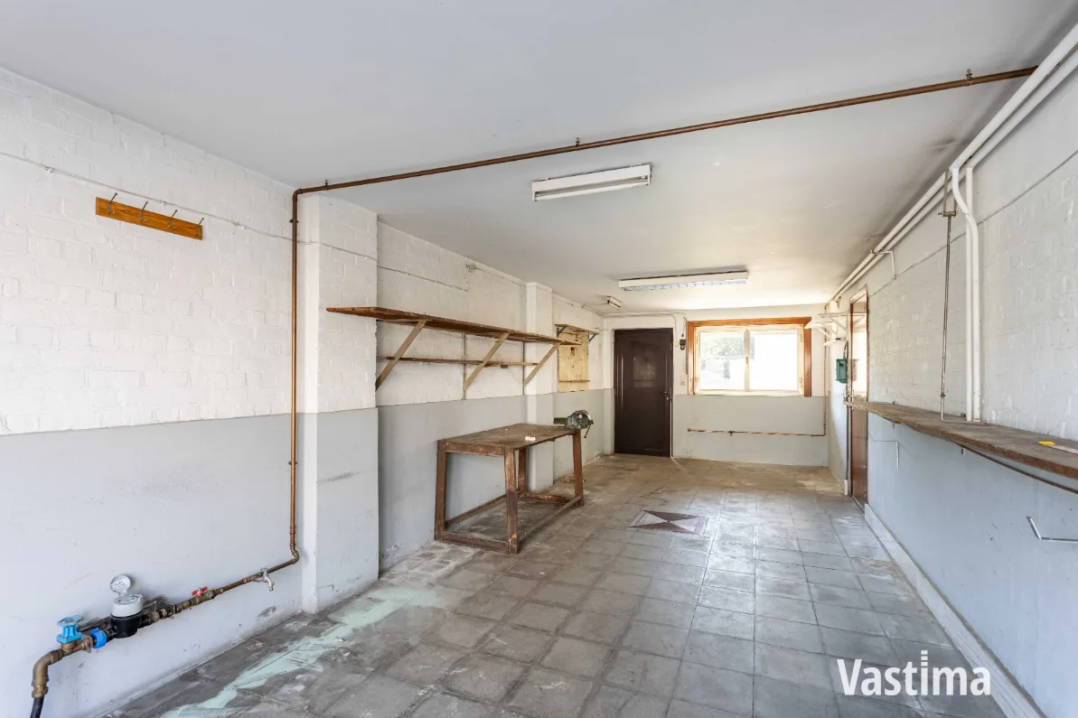 Immo Vastima - Huis Te koop Lebbeke - Woning met 3 slaapkamers, garage en ruime tuin