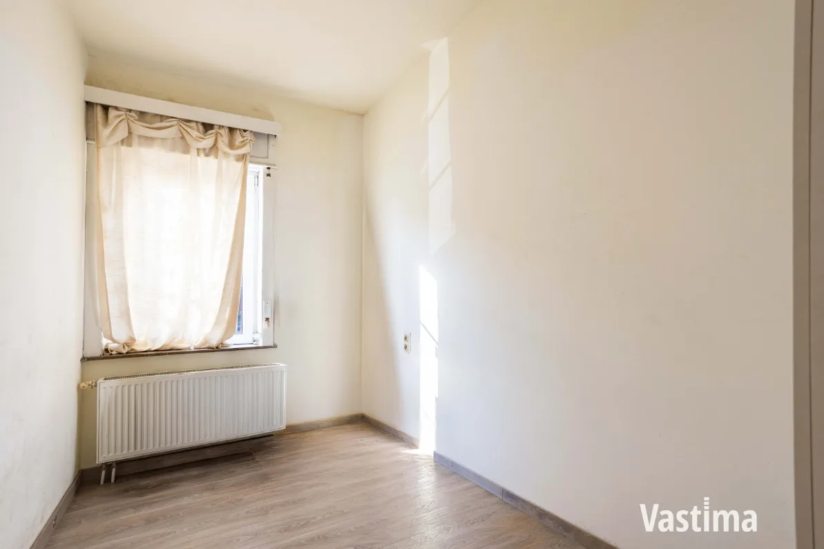 Immo Vastima - Huis Te koop Aalst - Instapklare stadswoning met 3 slaapkamers, 2 badkamers en tuin