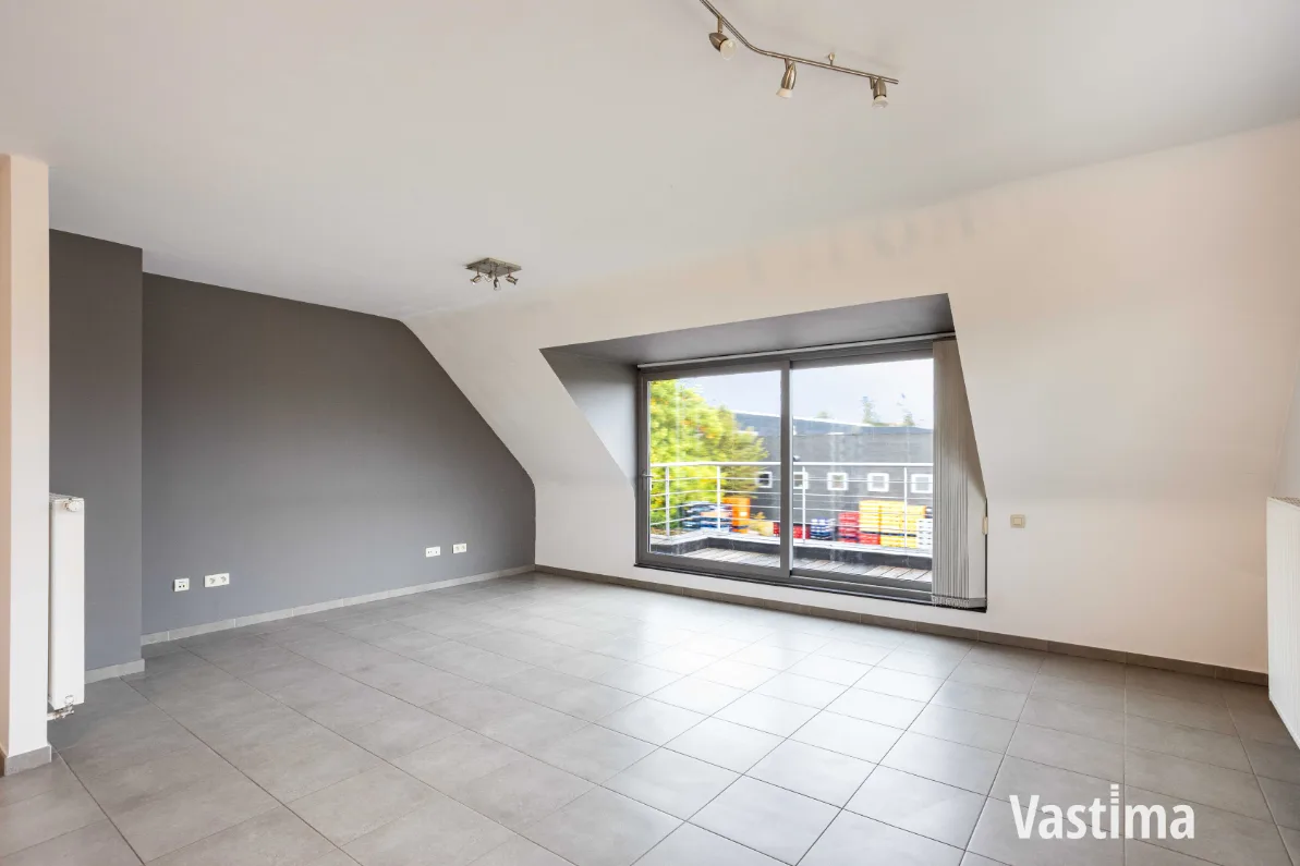 Immo Vastima - Appartement Te koop Aalst - Instapklaar 2-slaapkamerappartement met zuidgericht terras én garage