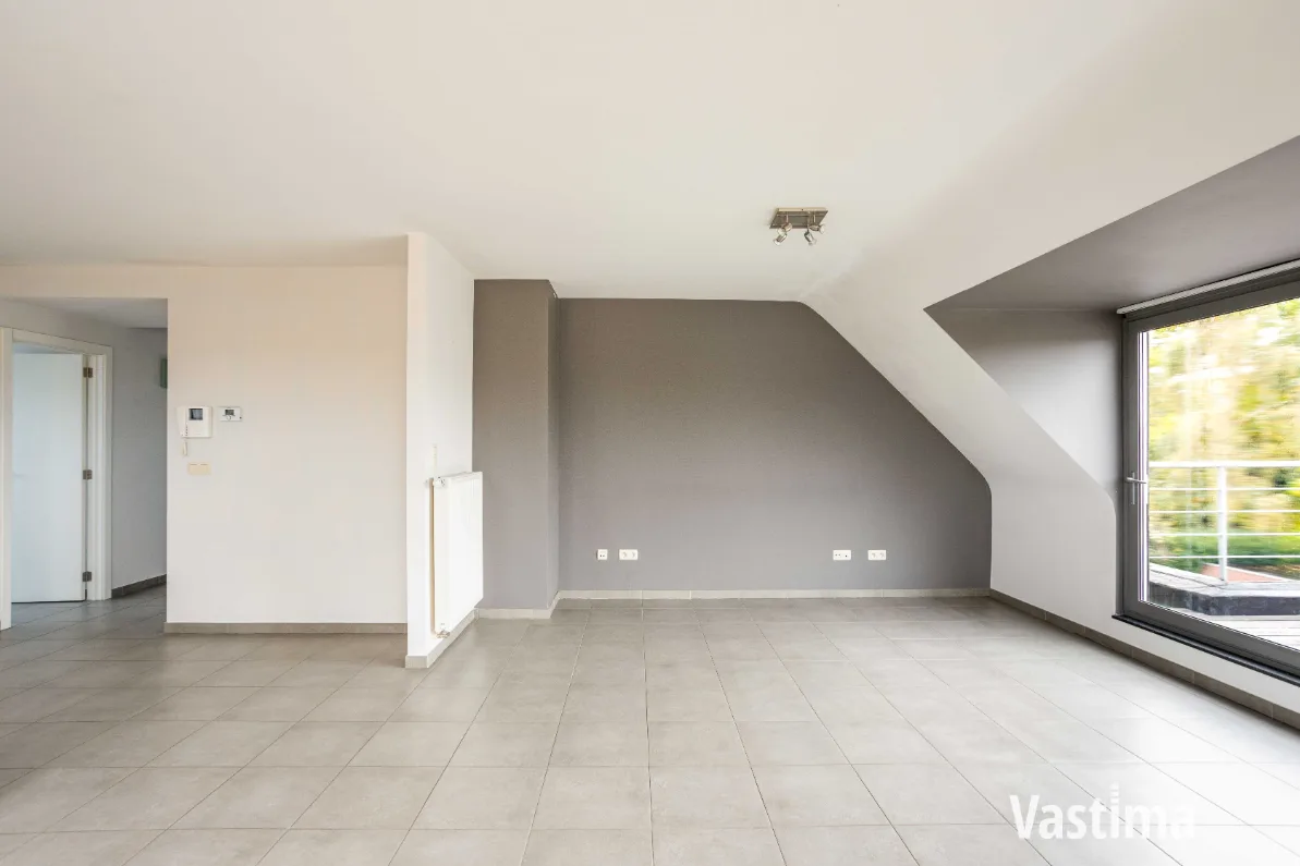 Immo Vastima - Appartement Te koop Aalst - Instapklaar 2-slaapkamerappartement met zuidgericht terras én garage