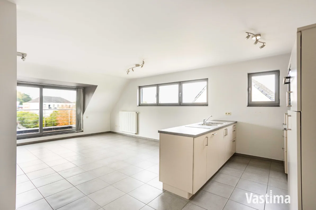 Immo Vastima - Appartement Te koop Aalst - Instapklaar 2-slaapkamerappartement met zuidgericht terras én garage