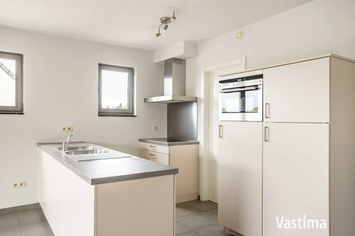 Immo Vastima - Appartement Te koop Aalst - Instapklaar 2-slaapkamerappartement met zuidgericht terras én garage