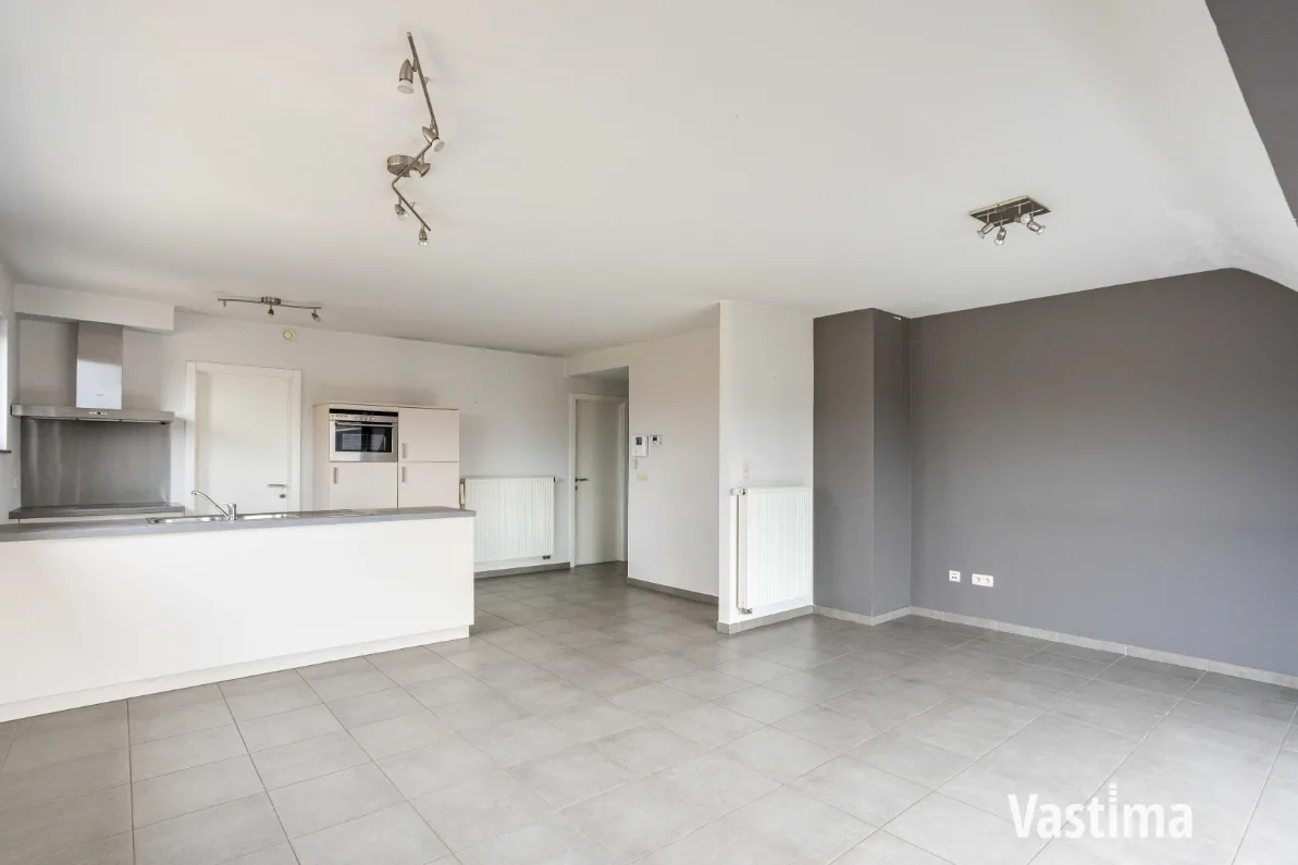 Immo Vastima - Appartement Te koop Aalst - Instapklaar 2-slaapkamerappartement met zuidgericht terras én garage