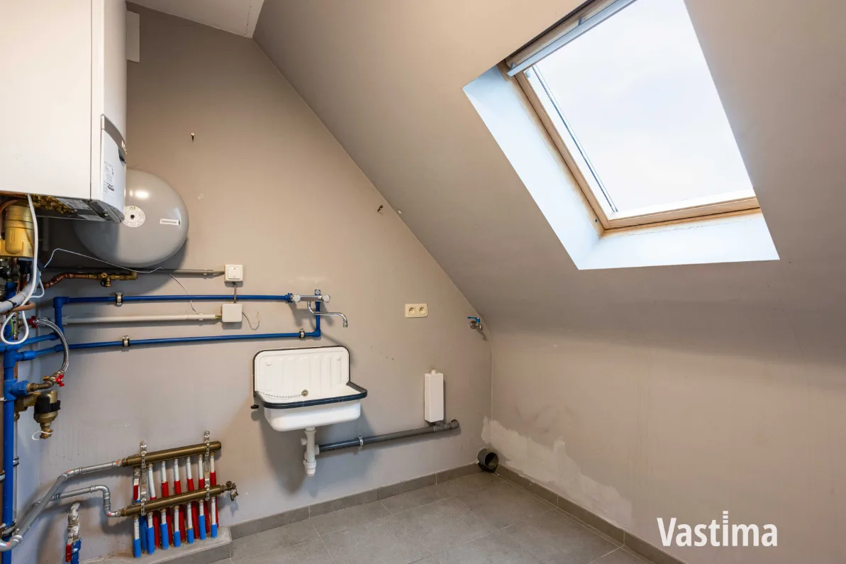 Immo Vastima - Appartement Te koop Aalst - Instapklaar 2-slaapkamerappartement met zuidgericht terras én garage
