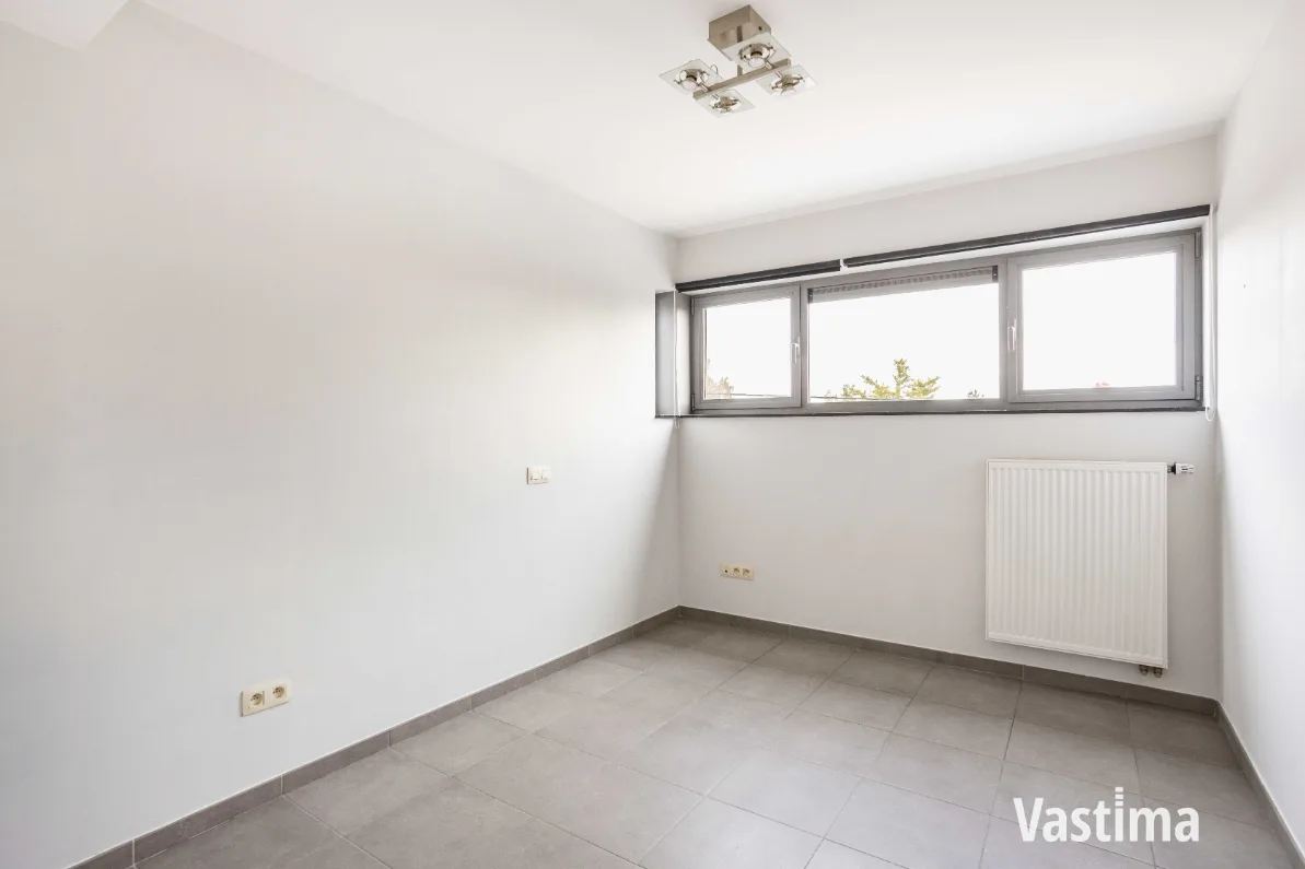 Immo Vastima - Appartement Te koop Aalst - Instapklaar 2-slaapkamerappartement met zuidgericht terras én garage