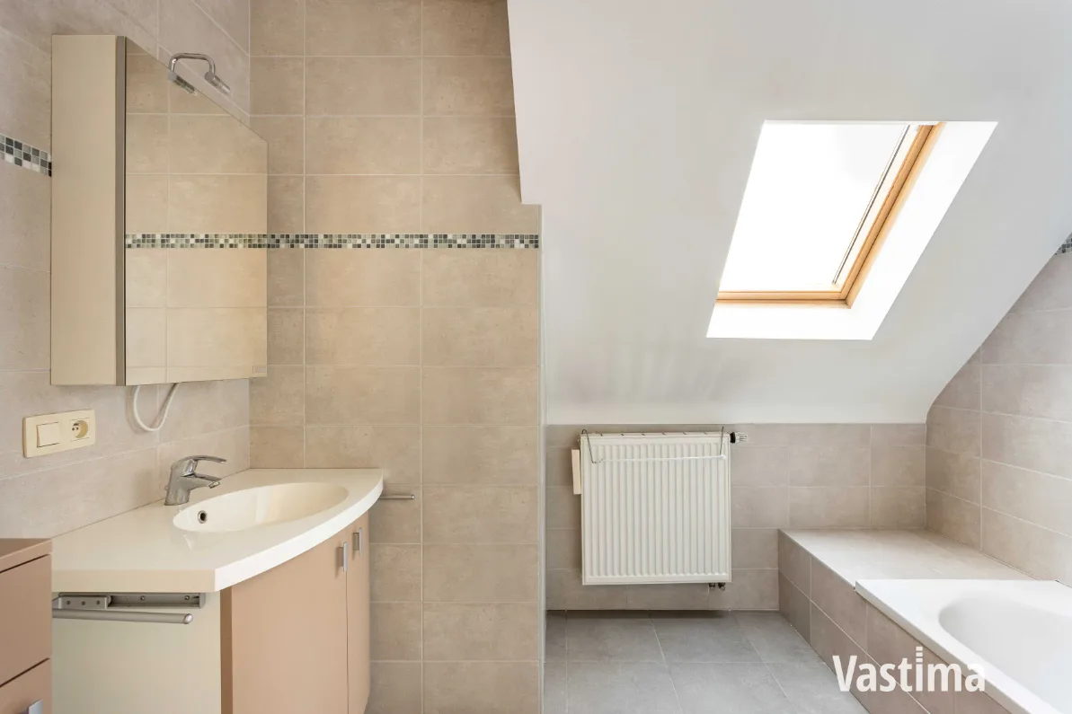 Immo Vastima - Appartement Te koop Aalst - Instapklaar 2-slaapkamerappartement met zuidgericht terras én garage