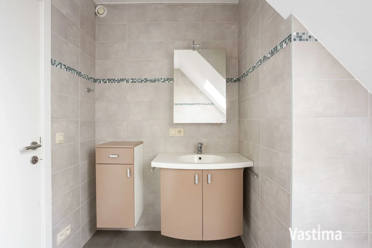 Immo Vastima - Appartement Te koop Aalst - Instapklaar 2-slaapkamerappartement met zuidgericht terras én garage