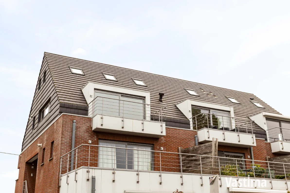 Immo Vastima - Appartement Te koop Aalst - Instapklaar 2-slaapkamerappartement met zuidgericht terras én garage
